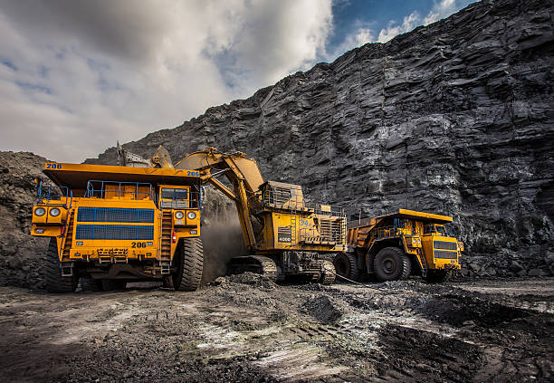Coal production at one of the open fields in the south of Siberia. Dumpers "BelAZ". September 2015.